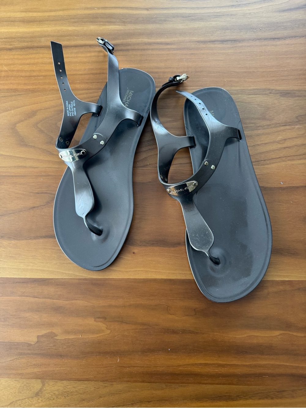 Michael Kors Black Jelly T-Strap Sandals with Silver Logo Accent